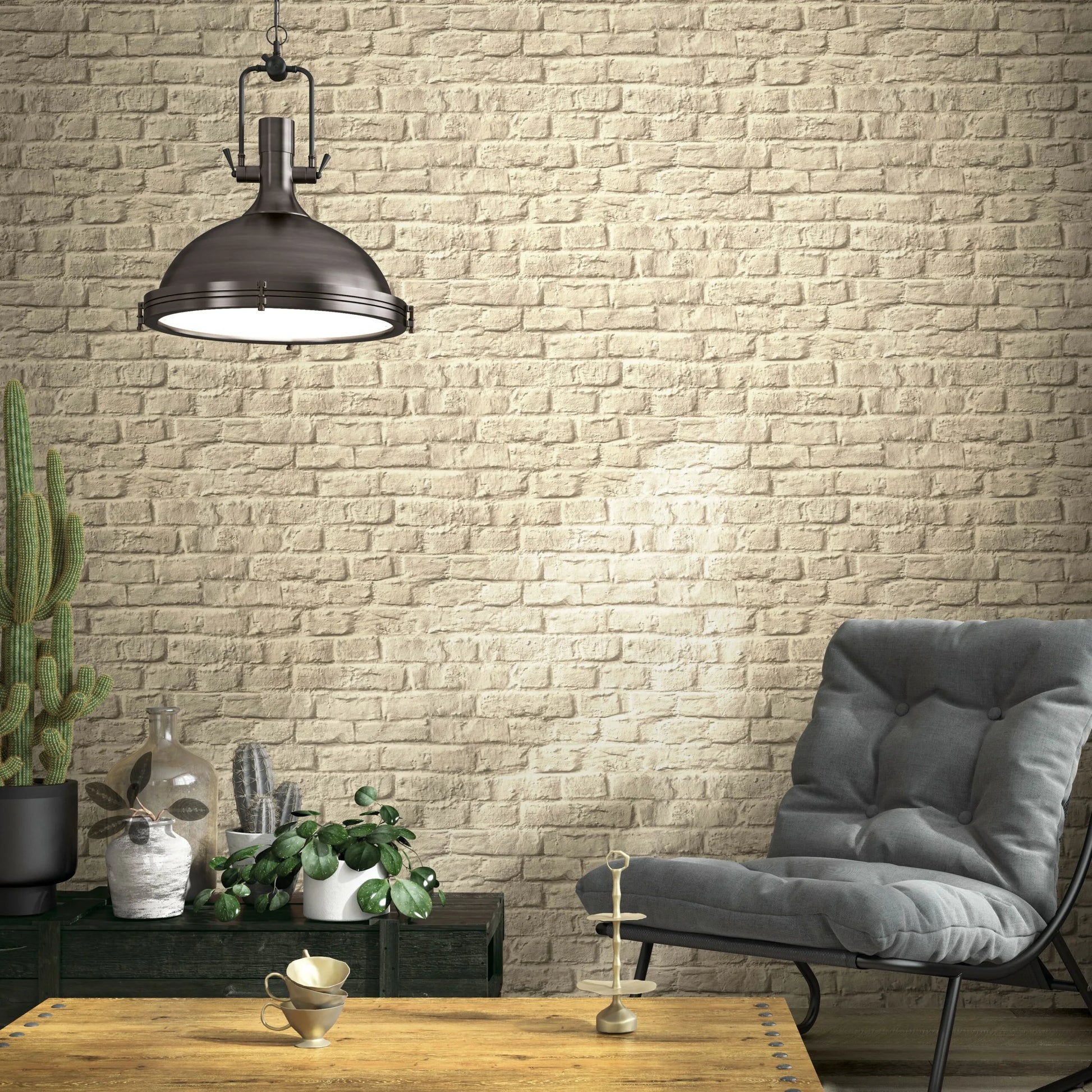 Marburg Loft Superior 34169 Light beige faux brick pattern with small, irregular bricks and subtle weathered shading wallpaper on a living room feature wall.