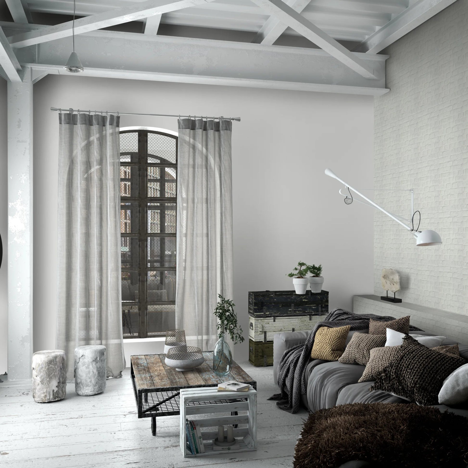 Marburg Loft Superior 34171 Loft-style living room featuring a light brick-effect wallpaper on the right wall, shown with an arched window, a sofa with cushions, and a coffee table.