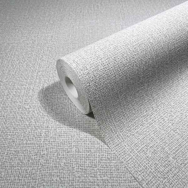 Marburg Loft Superior 34172 Angled wallpaper roll resting on matching light neutral crosshatch-textured wallpaper, highlighting the material and pattern.