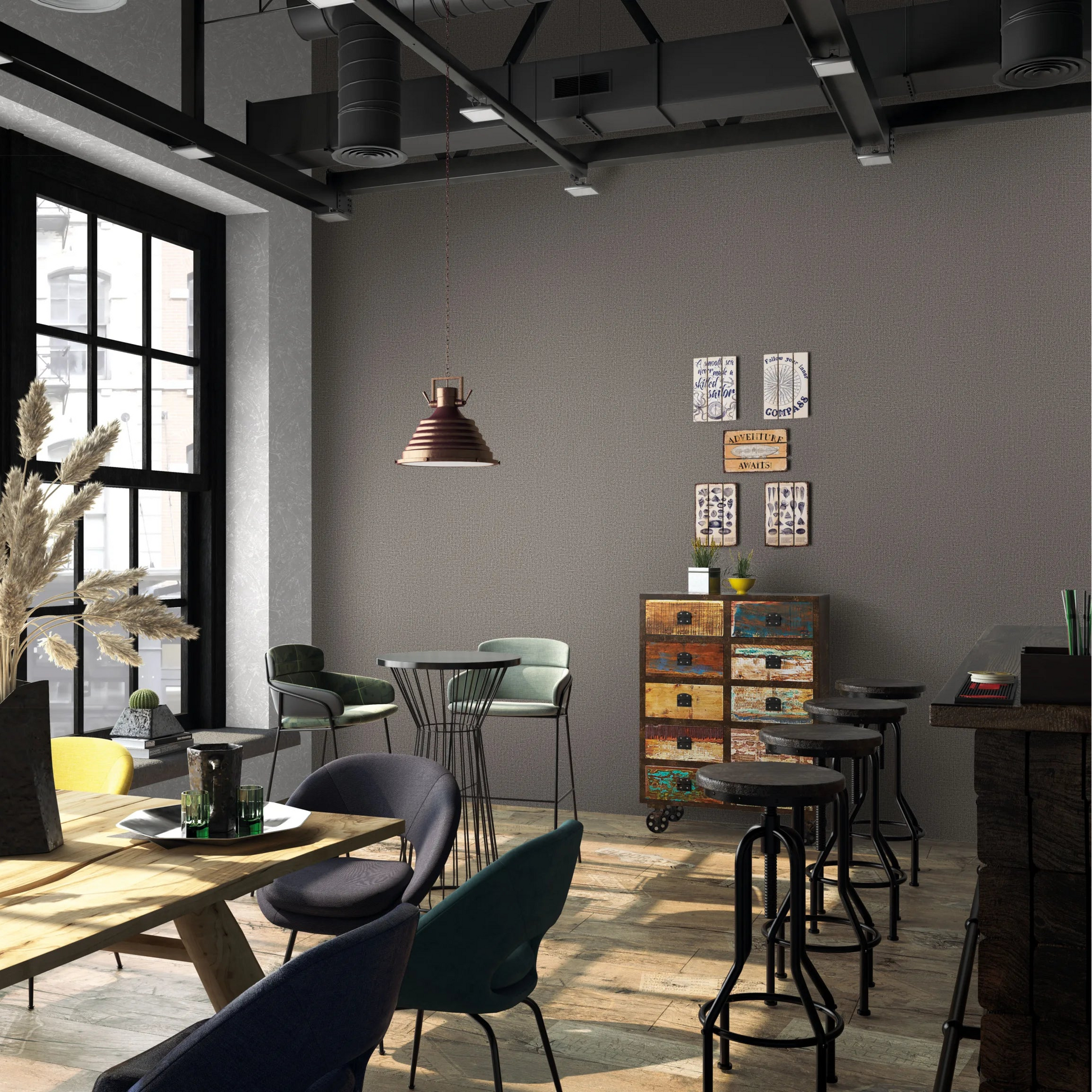 Marburg Loft Superior 34183 Industrial-style cafe scene featuring a brown textured wallpaper on the main wall, with bar stools, a pendant light, a dining table with a vase of pampas, large windows, and a colorful drawer cabinet.