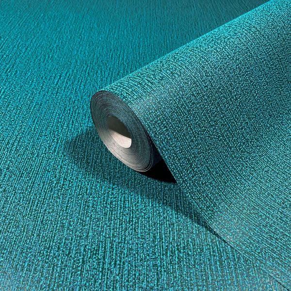 Marburg Mona 82482 Teal textured wallpaper roll with fine irregular vertical lines, shown resting on matching unrolled wallpaper.