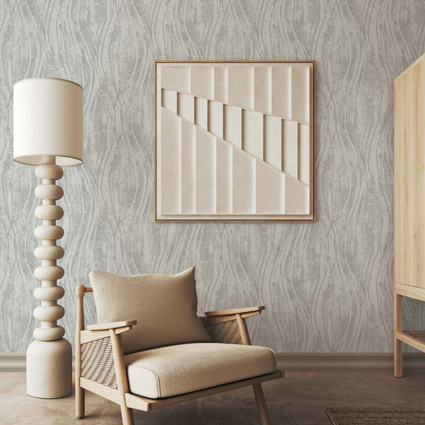Marburg Naomi 82495 Gray wallpaper with organic vertical wavy striations and a layered, textured look wallpaper on a living room feature wall.