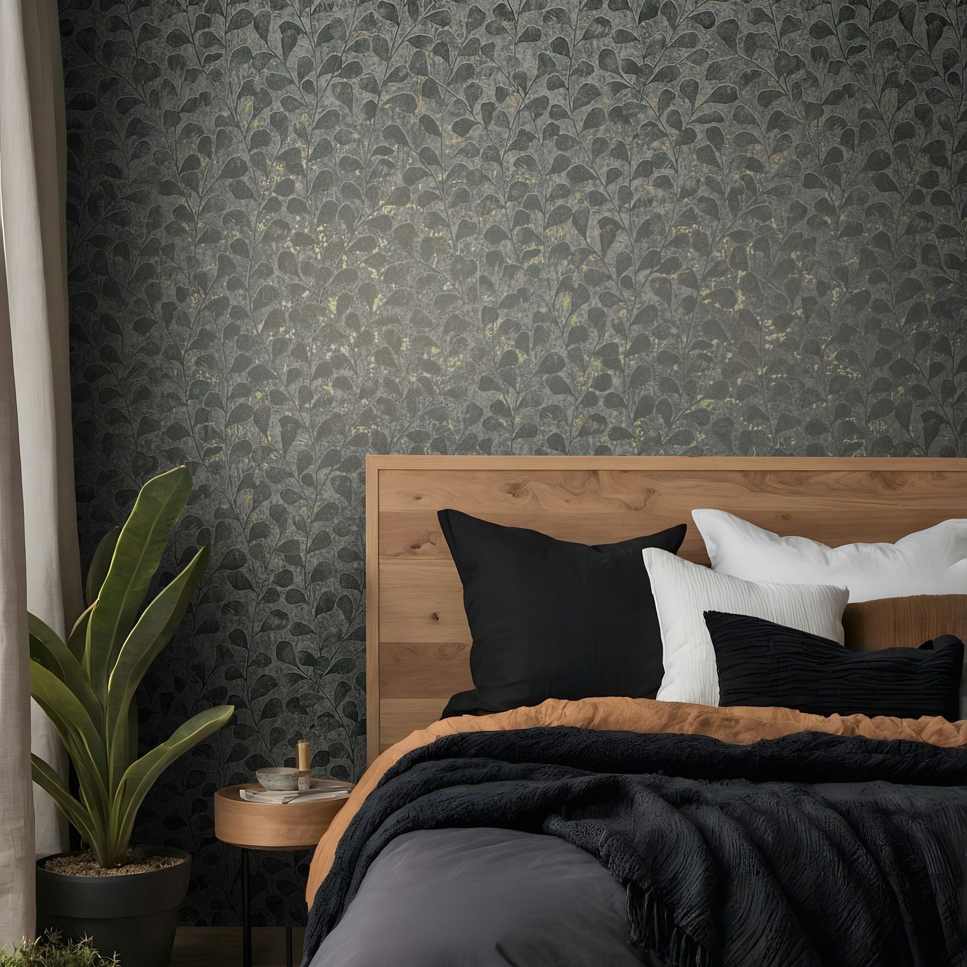 Marburg Naomi 82503 Dark gray wallpaper with a dense leafy vine motif and scattered gold-toned flecks wallpaper on a bedroom feature wall.