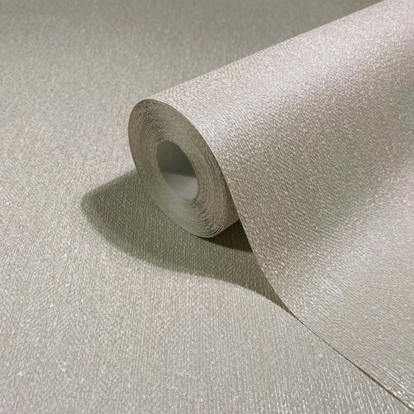Marburg Naomi 82536 Close-up of a textured neutral wallpaper roll partially unrolled on a matching surface, showing a fine grain and subtle sheen.