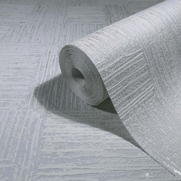 Marburg Naomi 82551 Close-up product shot of a wallpaper roll with a raised crosshatch texture in light grey, resting on an unrolled sheet of the same pattern.