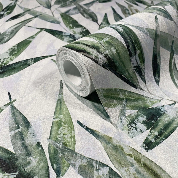 Marburg Naomi 89039 Wallpaper roll resting on matching surface with a painterly green leaf pattern on a light textured background.