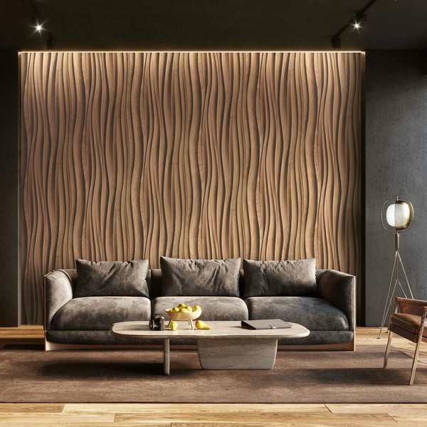 Marburg Novamur Mona 81667 Living room scene with a brown wavy textured wallpaper feature wall behind a gray sofa, a low coffee table with fruit, a rug, and a floor lamp.