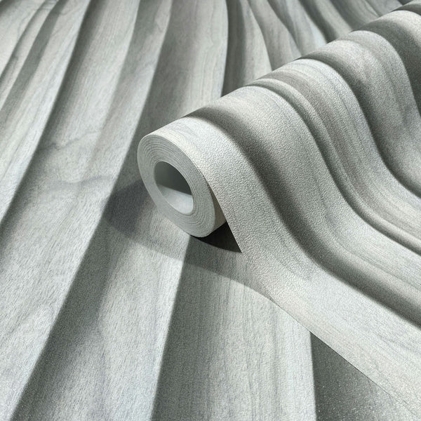 Marburg Novamur Mona 81669 Close-up of a wallpaper roll on a matching unrolled sheet showing a grey and white wavy stripe pattern with subtle texture.