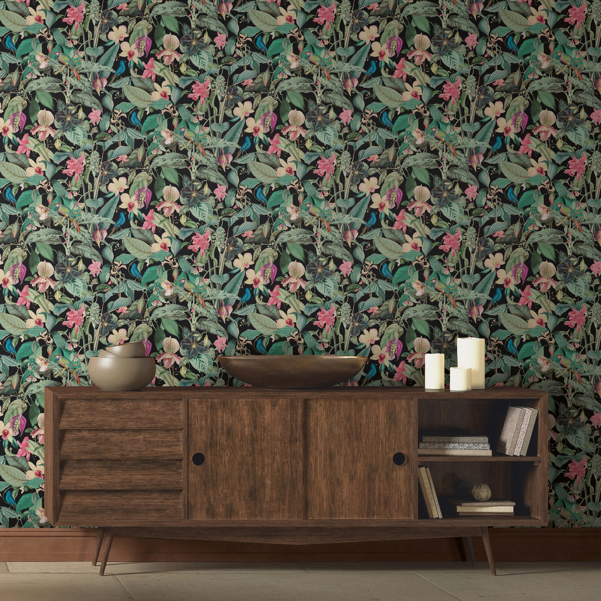 Marburg Novamur Mona 81685 dense tropical botanical print with green leaves, pink flowers, and small birds on a dark ground wallpaper on a styled interior feature wall.