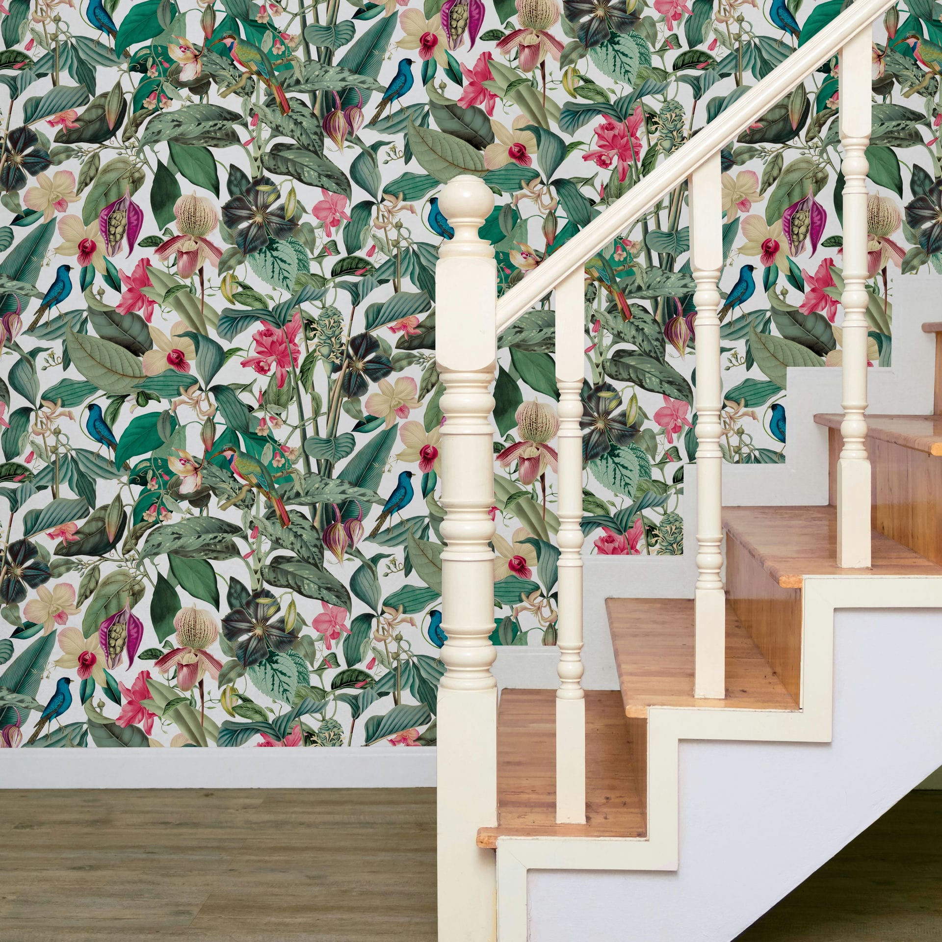 Marburg Novamur Mona 81686 Botanical wallpaper with green leaves, pink and cream flowers, and small birds on a light background behind a white staircase with wood treads.