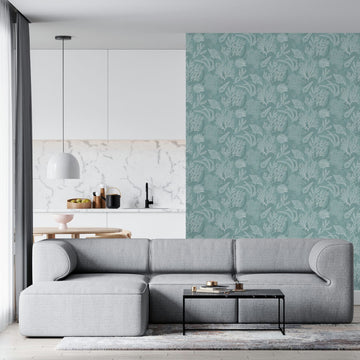 Marburg Novamur Mona 81688 Green wallpaper with a white line-drawn botanical pattern of leaves and flowers in a repeating motif wallpaper on a living room feature wall.