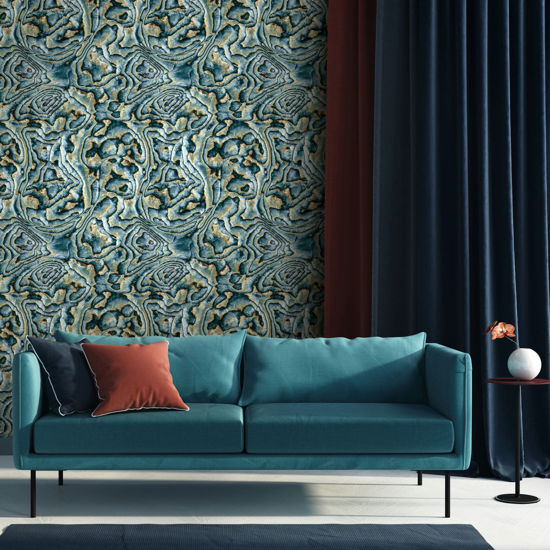 Marburg Novamur Mona 81692 Abstract geode-style wallpaper in blue, green, and beige behind a teal sofa with cushions, dark curtains, and a small side table holding a round vase with a single flower.