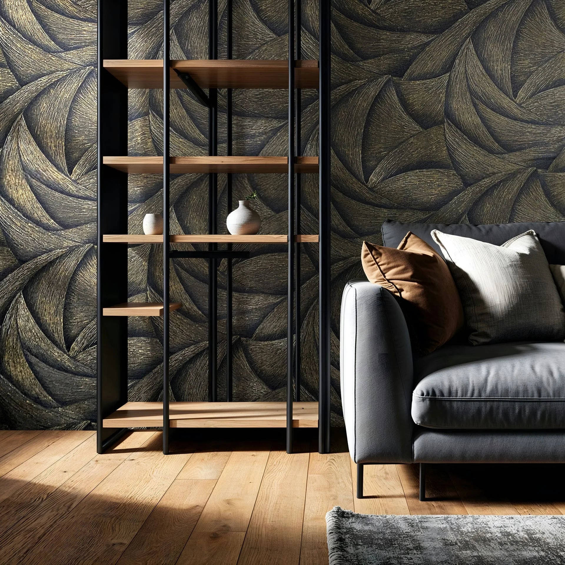 Marburg Ritus 35506 Black and gold abstract swirl wallpaper behind a metal-and-wood shelving unit and a gray sofa with cushions on a wood floor, with a small rug at the bottom edge.