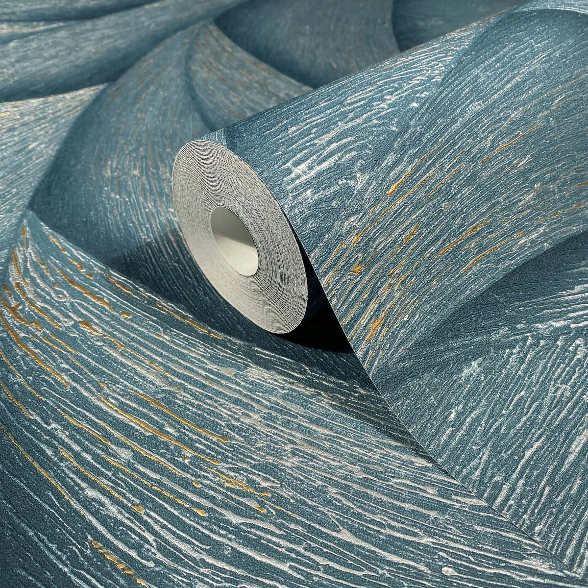 Marburg Ritus 35507 Close-up of a blue wallpaper roll showing irregular metallic striations and textured surface.