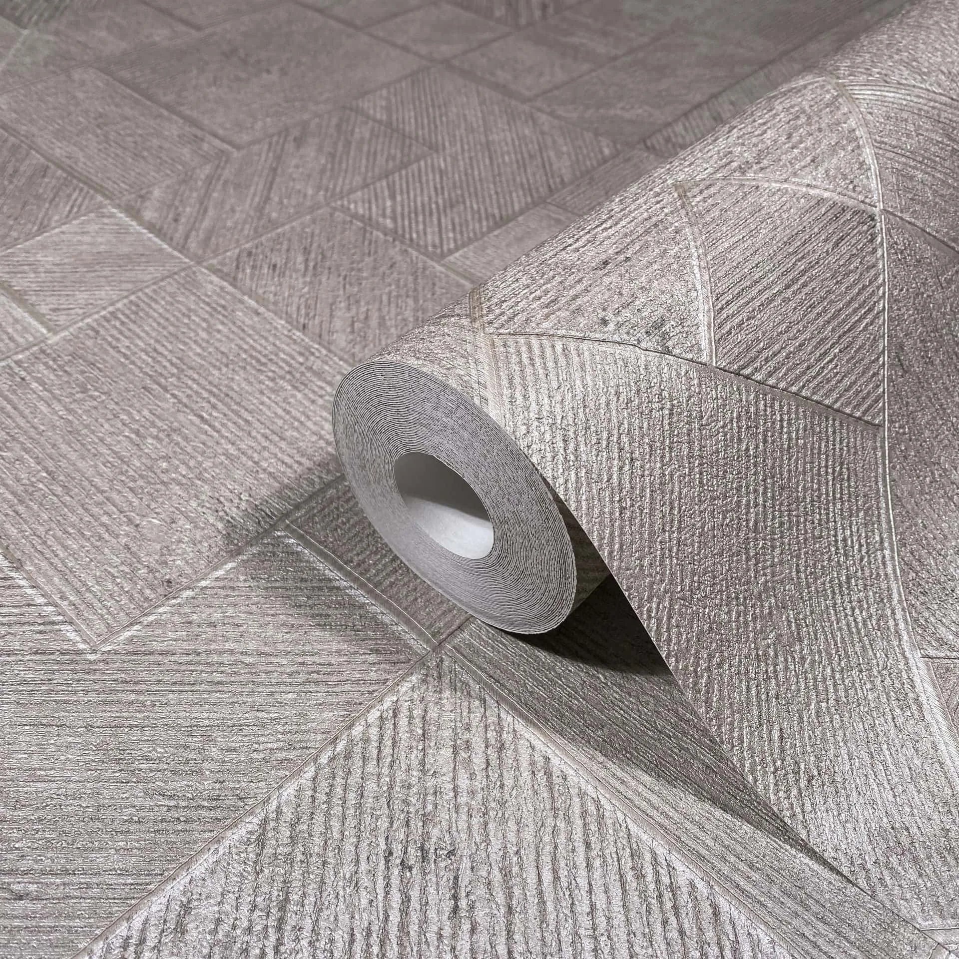 Marburg Ritus 35510 Wallpaper roll on matching unrolled wallpaper showing a geometric block pattern of squares and rectangles with fine linear texture in beige and gray.