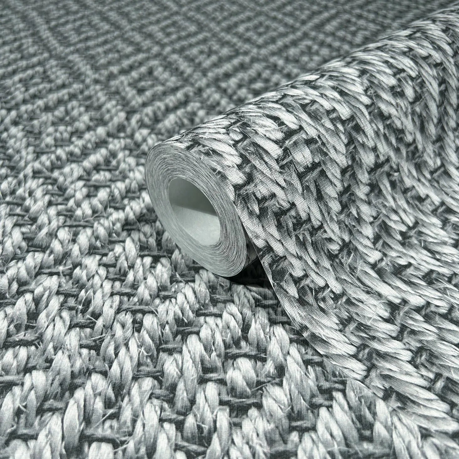 Marburg Struktura 45746 Gray faux woven basketweave/rope texture print with pronounced shading for a 3D effect wallpaper roll showing its textured surface and finish.