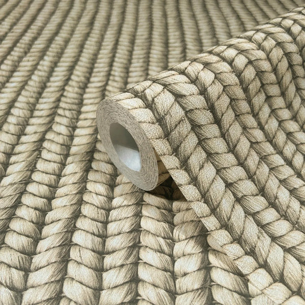 Marburg Struktura 45749 Close-up of a wallpaper roll showing a beige braided rope design with shaded, textured effect, resting on matching unrolled wallpaper.