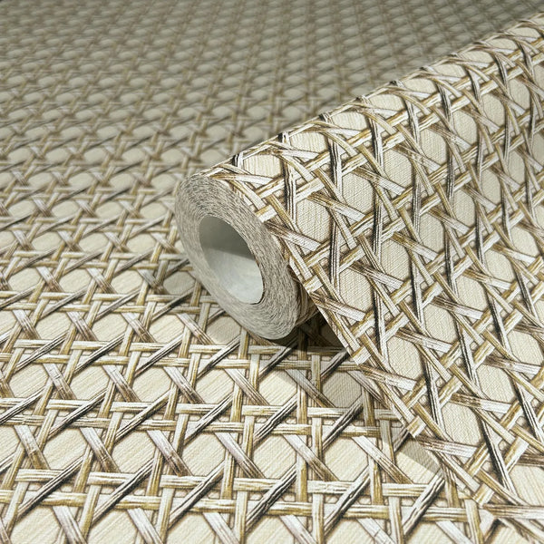 Marburg Struktura 45752 A wallpaper roll resting on matching wallpaper printed with a beige cane-style lattice weave pattern in tan and cream forming a diamond grid.