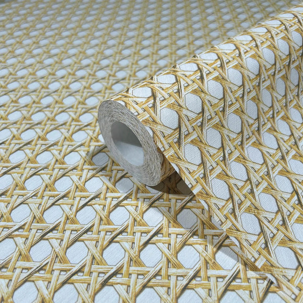 Marburg Struktura 45753 Close-up of a wallpaper roll resting on matching wallpaper with a beige cane lattice pattern on a light background.