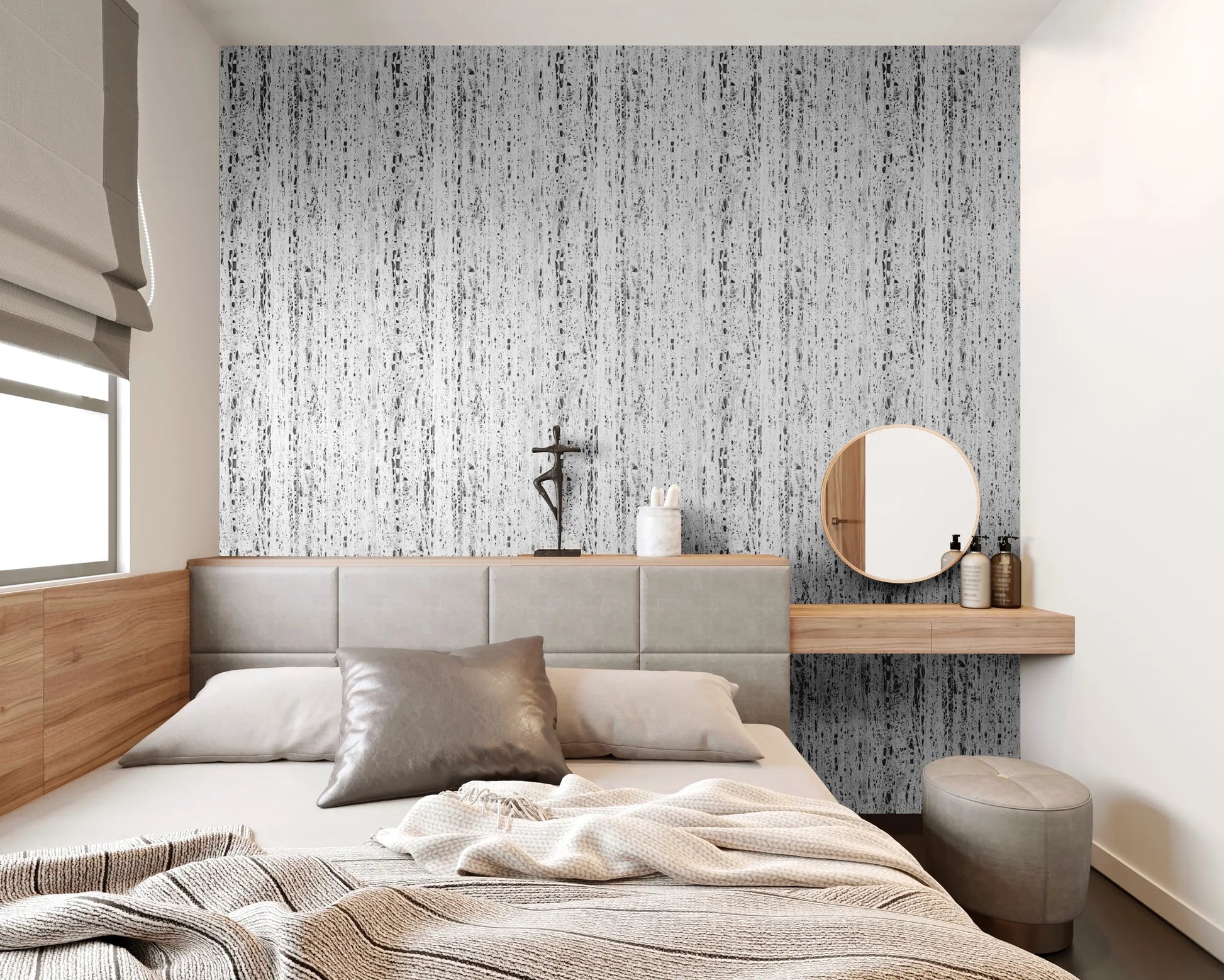 Marburg Travertino 33353 Bedroom scene showing a gray wallpaper with irregular vertical black streaks behind an upholstered headboard, alongside a floating wood vanity with a round mirror and neutral bedding.