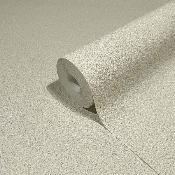 Marburg Travertino 33363 Close-up of a beige speckled wallpaper roll resting on a matching unrolled sheet.