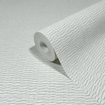 Marburg Travertino 33381 Close-up of a light gray and white textured wallpaper roll with irregular horizontal ridges, resting on the same pattern surface.