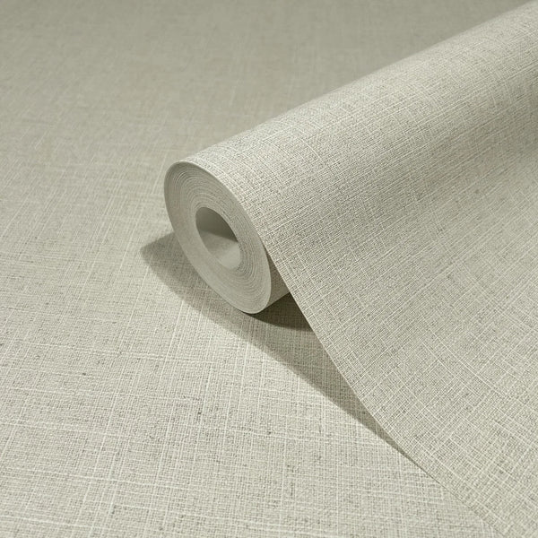 Marburg Travertino 33391 An angled wallpaper roll resting on the same material, showing a light beige crosshatch, linen-like texture.