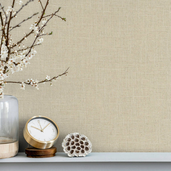 Marburg Travertino 33392 Beige wallpaper with a subtle linen-look crosshatch texture forming an irregular grid wallpaper shown in a styled detail.