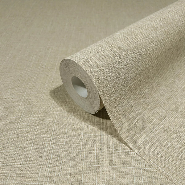Marburg Travertino 33392 A beige wallpaper roll with a fine crosshatch texture, partially unrolled on a matching surface.