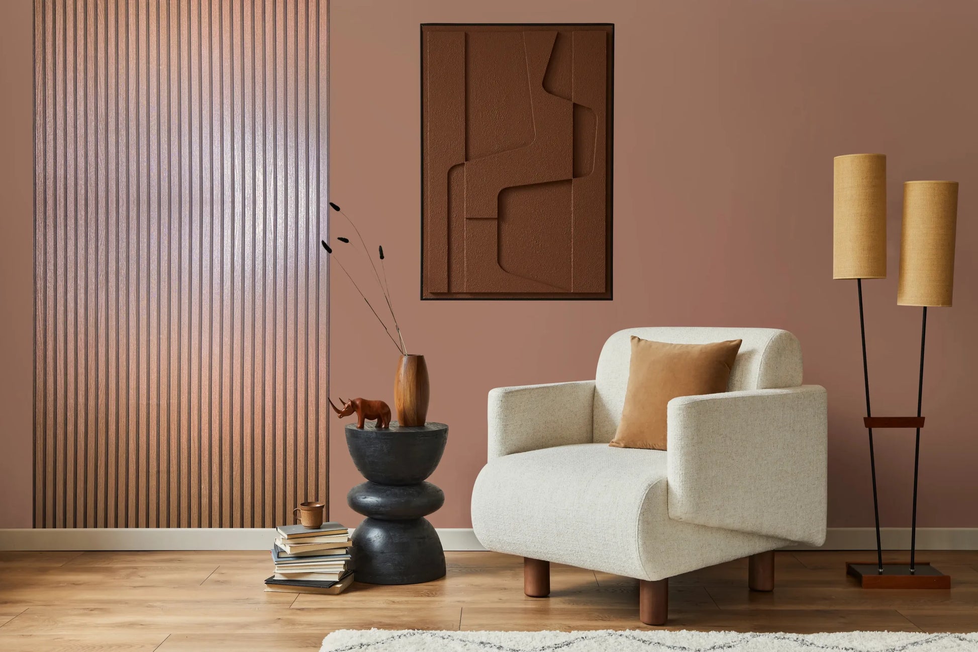 Marburg Travertino 33397 Narrow vertical ribbed stripes with a dimensional texture in a warm copper tone with a subtle sheen wallpaper on a living room feature wall.