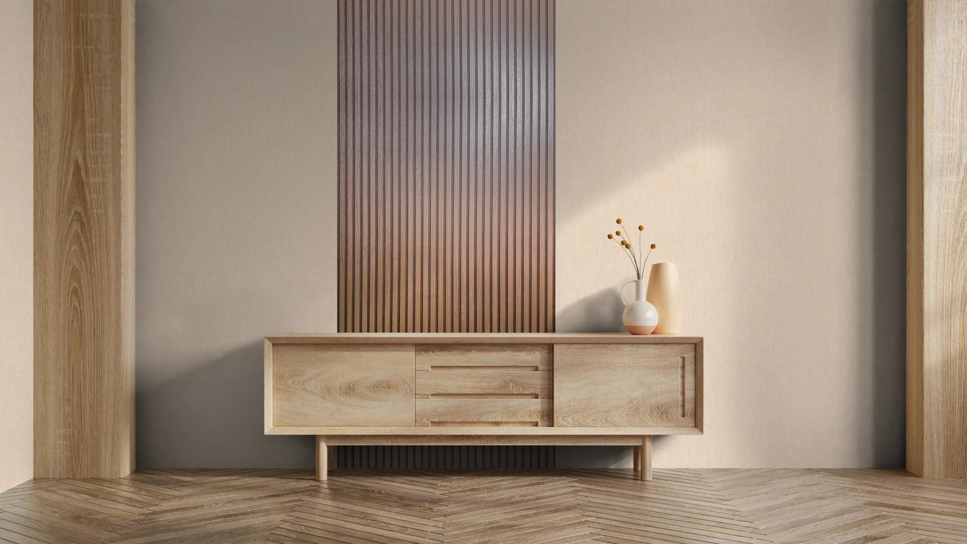Marburg Travertino 33397 Light neutral wall with a vertical copper-toned ribbed wallpaper panel used as a feature, behind a natural wood sideboard with two vases and stems.