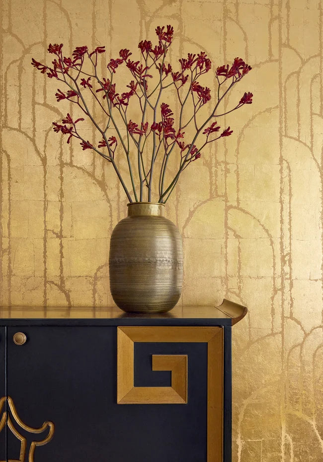 Thibaut t24414 Deco Moon wallpaper with Metal Leaf on Non Woven styled beside a decorative vase detail.