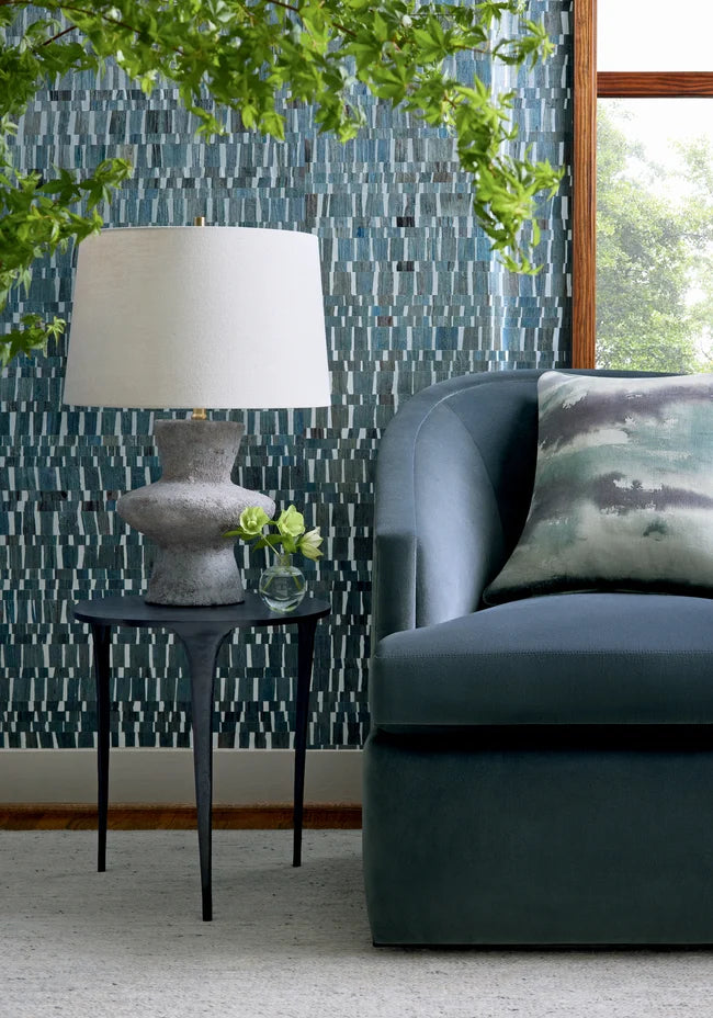 Thibaut Namonaki wallpaper with Waterlily Leaves and Foil on Non Woven styled beside a decorative vase detail.