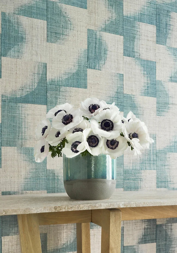 Thibaut Raffia Squares wallpaper with Raffia on Non Woven styled beside a decorative vase detail.