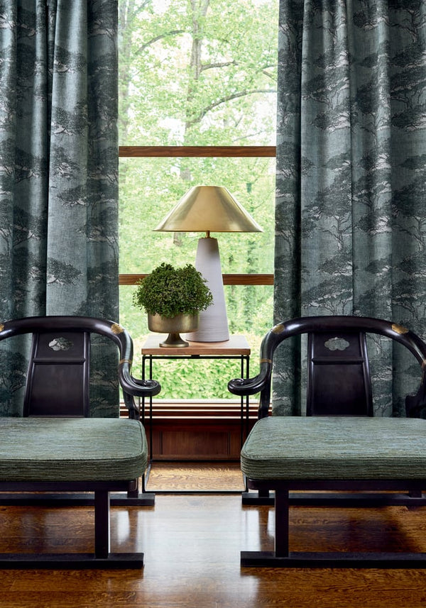 Thibaut Torrey Pines wallpaper with Linen Mesh on Non Woven shown on a feature wall in a contemporary lounge.
