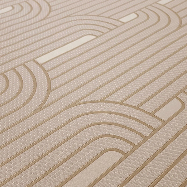 Close-up of a textured beige wallpaper with wavy lines